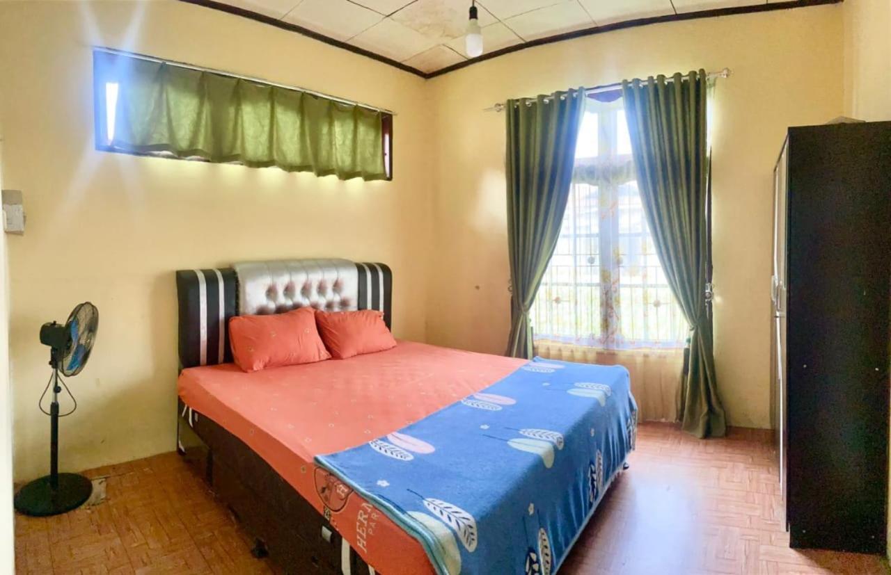 Malin'S Homestay ブキティンギ エクステリア 写真